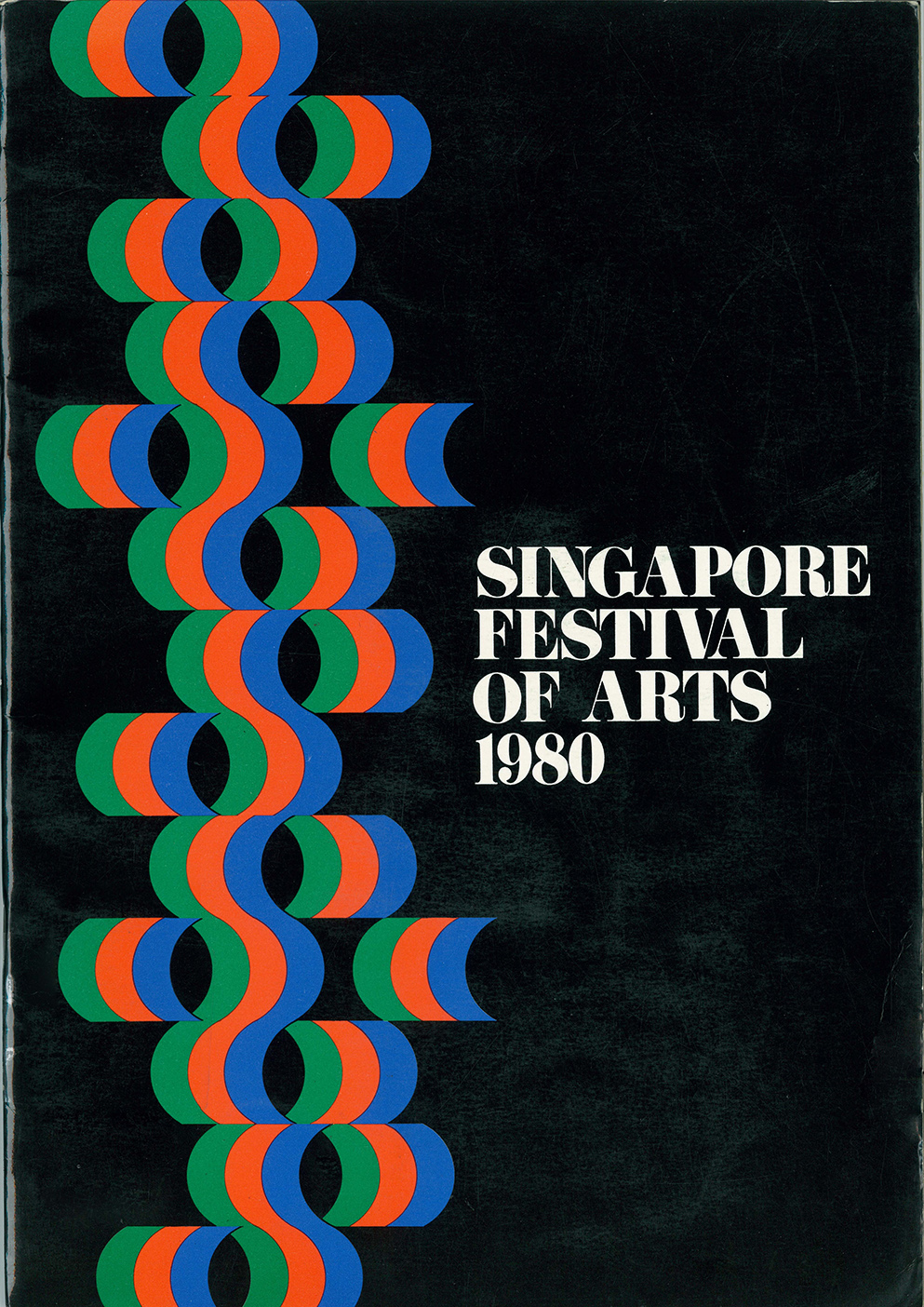 The programme features a pattern of green, red and blue crescent moon shapes extending down from the top left corner to the bottom left corner. Beside the pattern are the words 'Singapore Festival of Arts 1980' in white font against a black background.