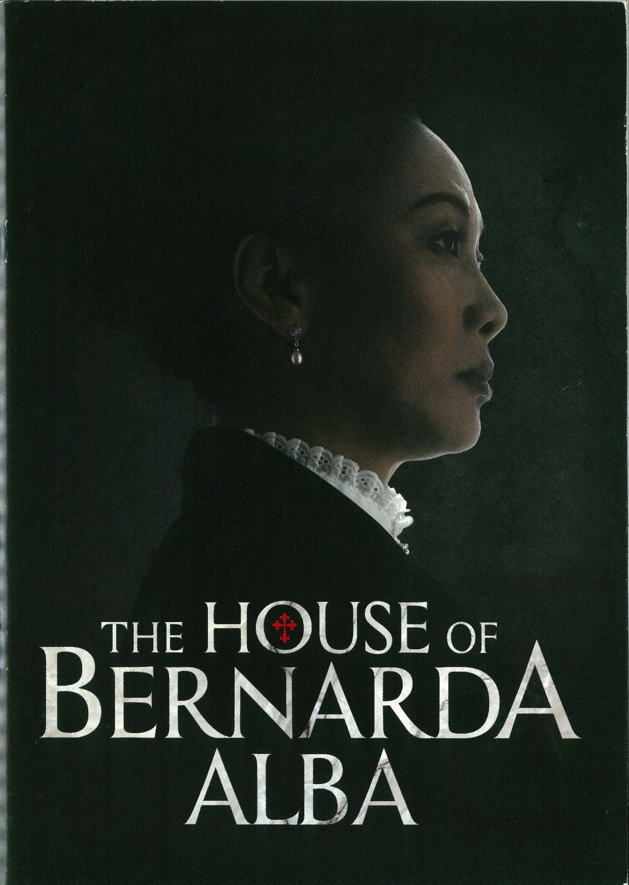 The programme has a dark background, with a side portrait of a female figure. Her hair is visibly neat and tied up, and she is wearing a dangling pearl earring, and a ruffled collared shirt with a black outerwear. The tile appears in white font at the bottom of the image.