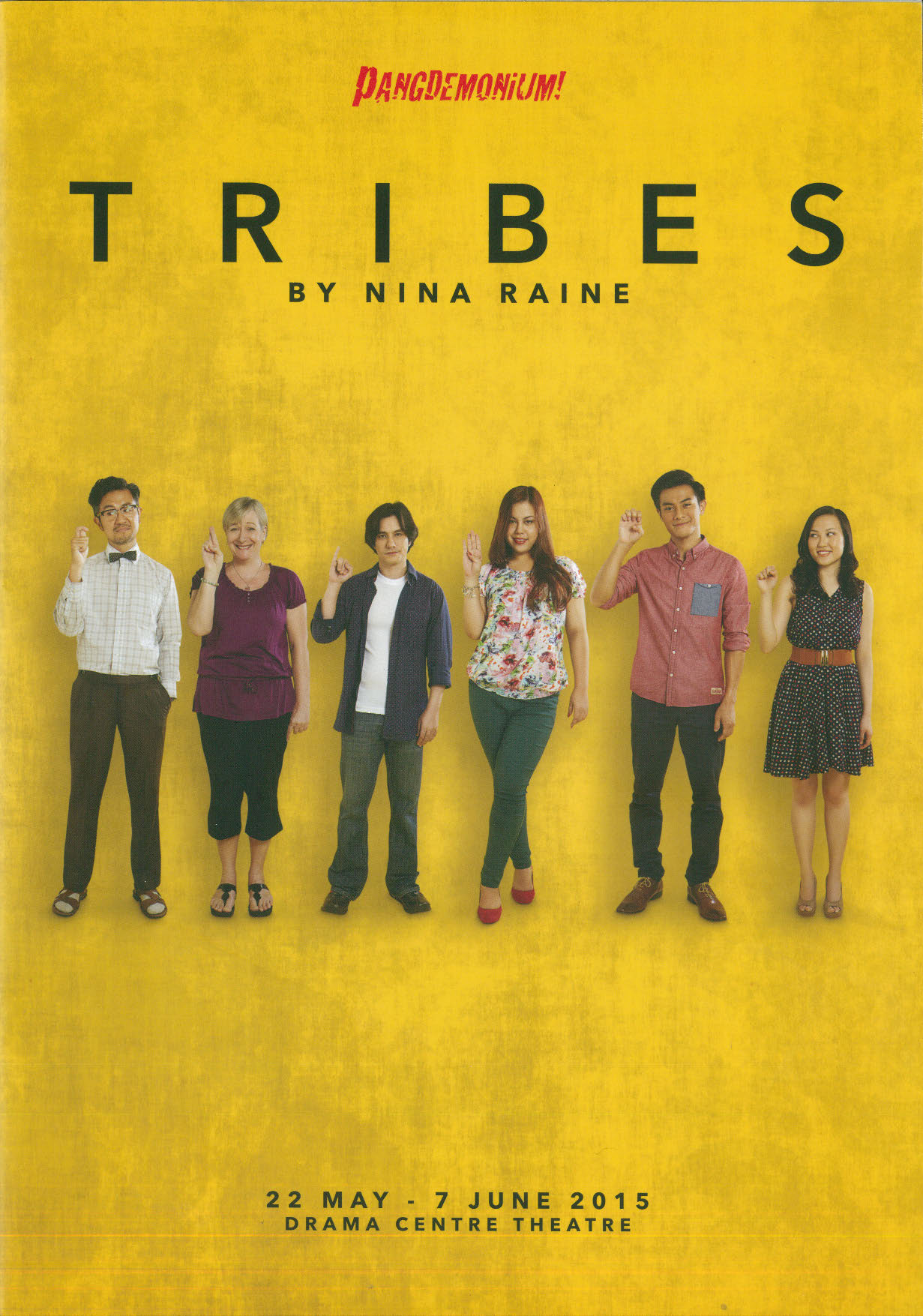 The programme features the cast of the play standing in line, against a bright yellow background 