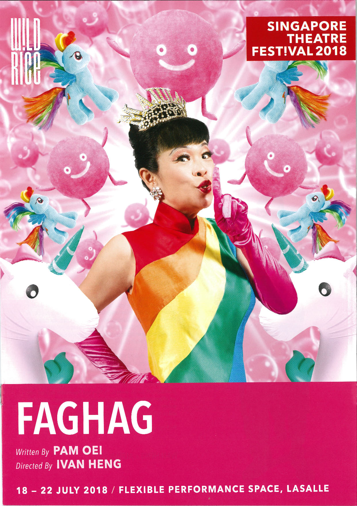 A female-presenting person in a sleeveless rainbow-coloured top, long pink gloves and a silver tiara, against a pink background filled with images of unicorns and the Pink Dot mascot. She holds her left hand to her mouth in a shushing gesture.