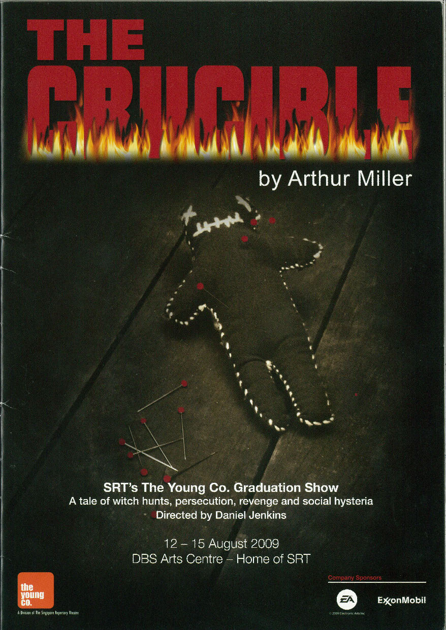 The programme cover features a black white stitched doll on black wooden panel floor with pins attached into it. The production title overlays on the black background in red text with first motifs.