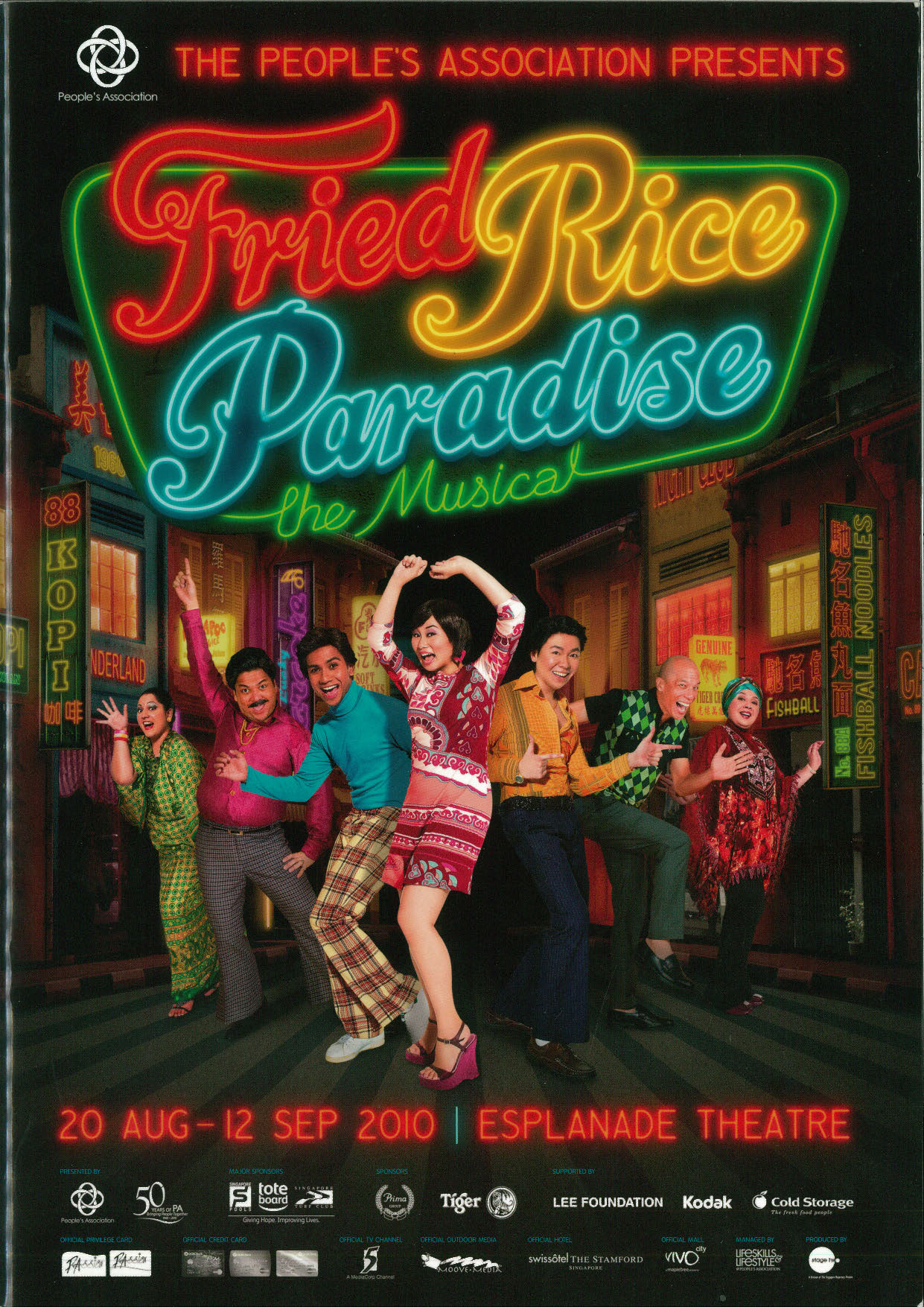 The programme cover features 7 people of varying ages dressed in bright 1980's fashion with the production title in a neon lighted signage.