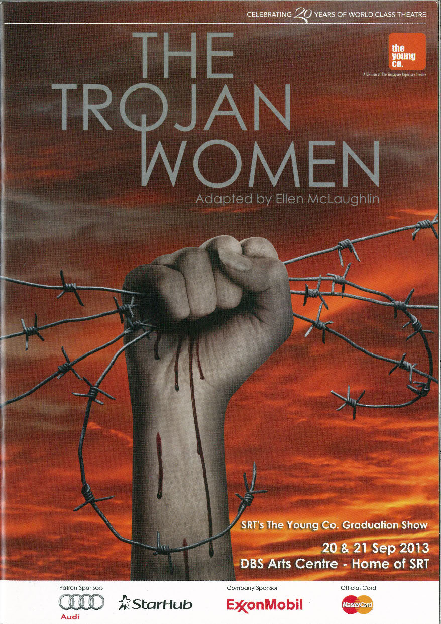 A red tinted sky in the background, with the production title in grey text and a bleeding hand in a fist from clenching on barbwires. 