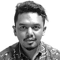 Black and white headshot of Taufik Darwis.