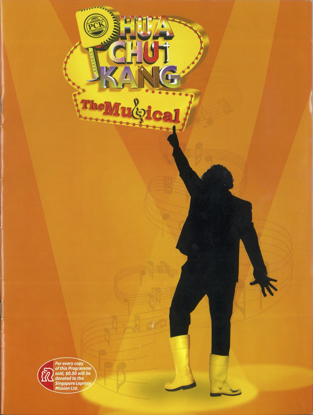 The programme features a human silhouette under a spotlight, wearing yellow boots, with one hand raised, against an orange background