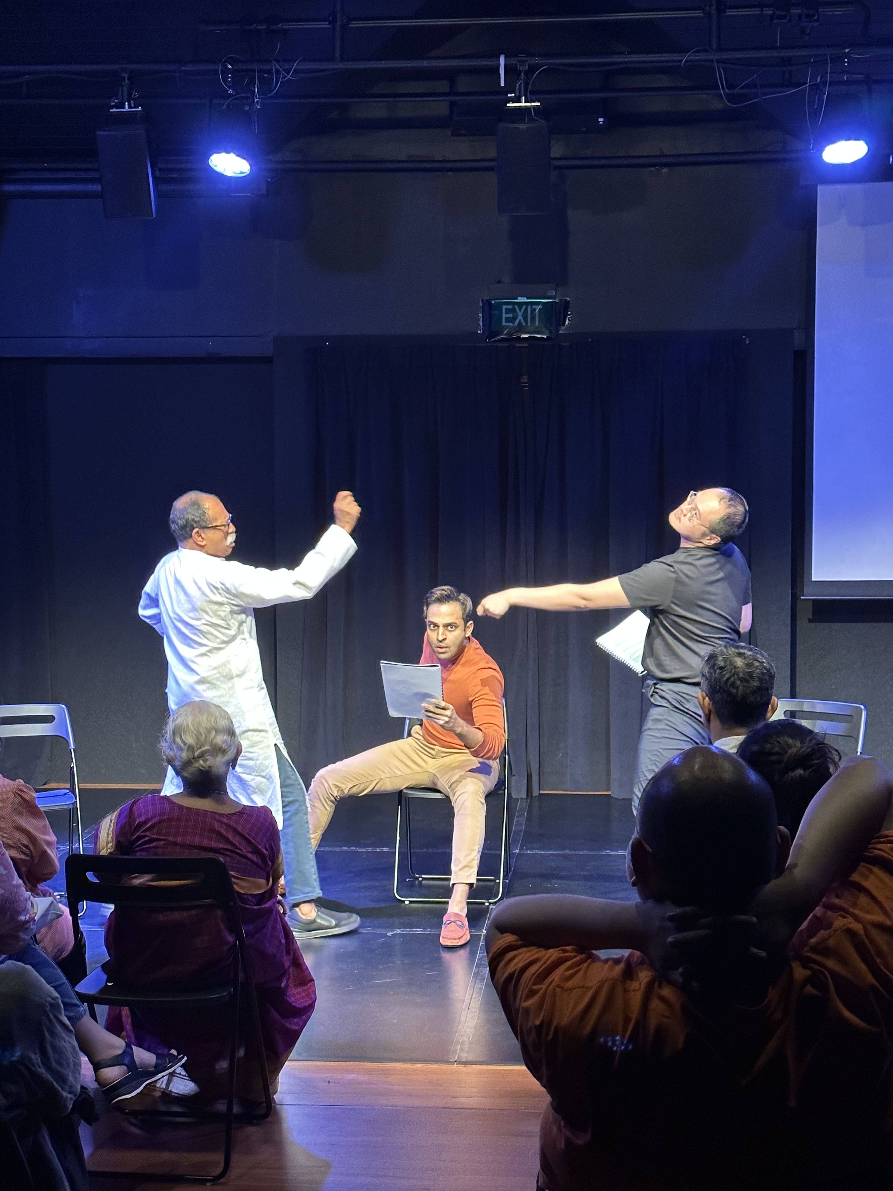 A photograph of the Studio B dramatised reading, featuring the cast of "Help! Our Dead have Dementia, and Other Stories" by A Yagnya.