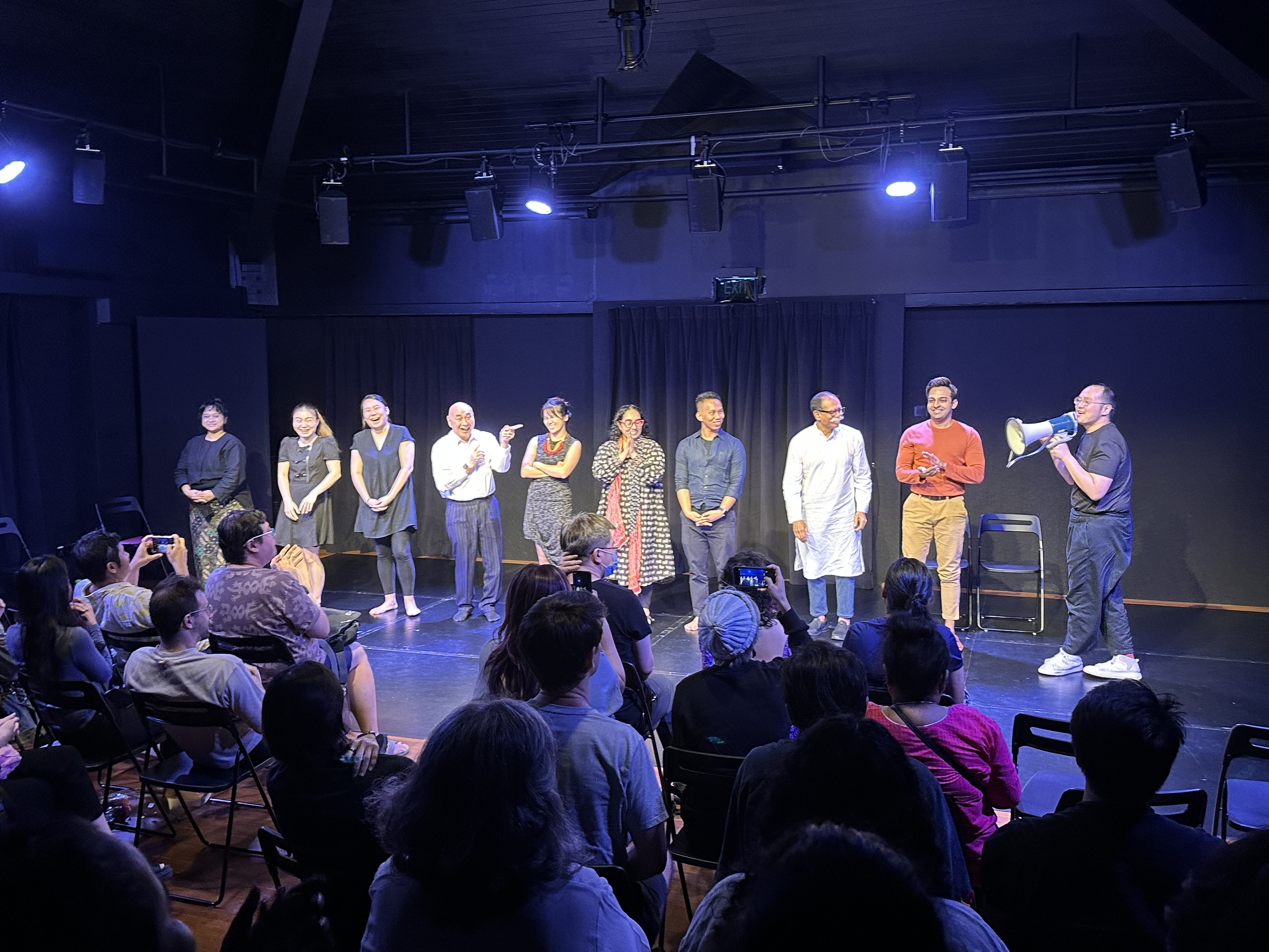 A photograph at curtain call for Studio B, with the cast and playwrights.