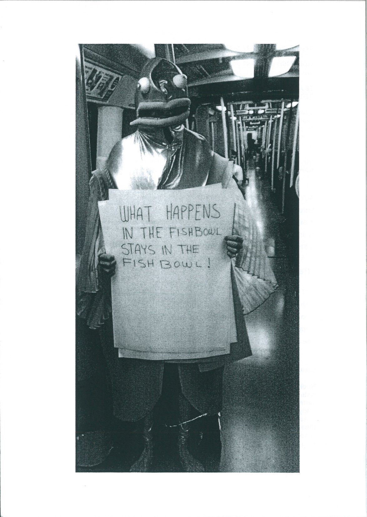 The programme features a black and white photo of a person wearing a fish mask, standing in a train holding a sign saying 'What happens in the fishbowl stays in the fishbowl!'