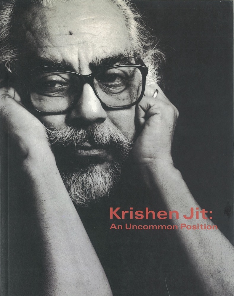 The publication features a black and white photo of Krishen Jit looking neutral, hands against his face.