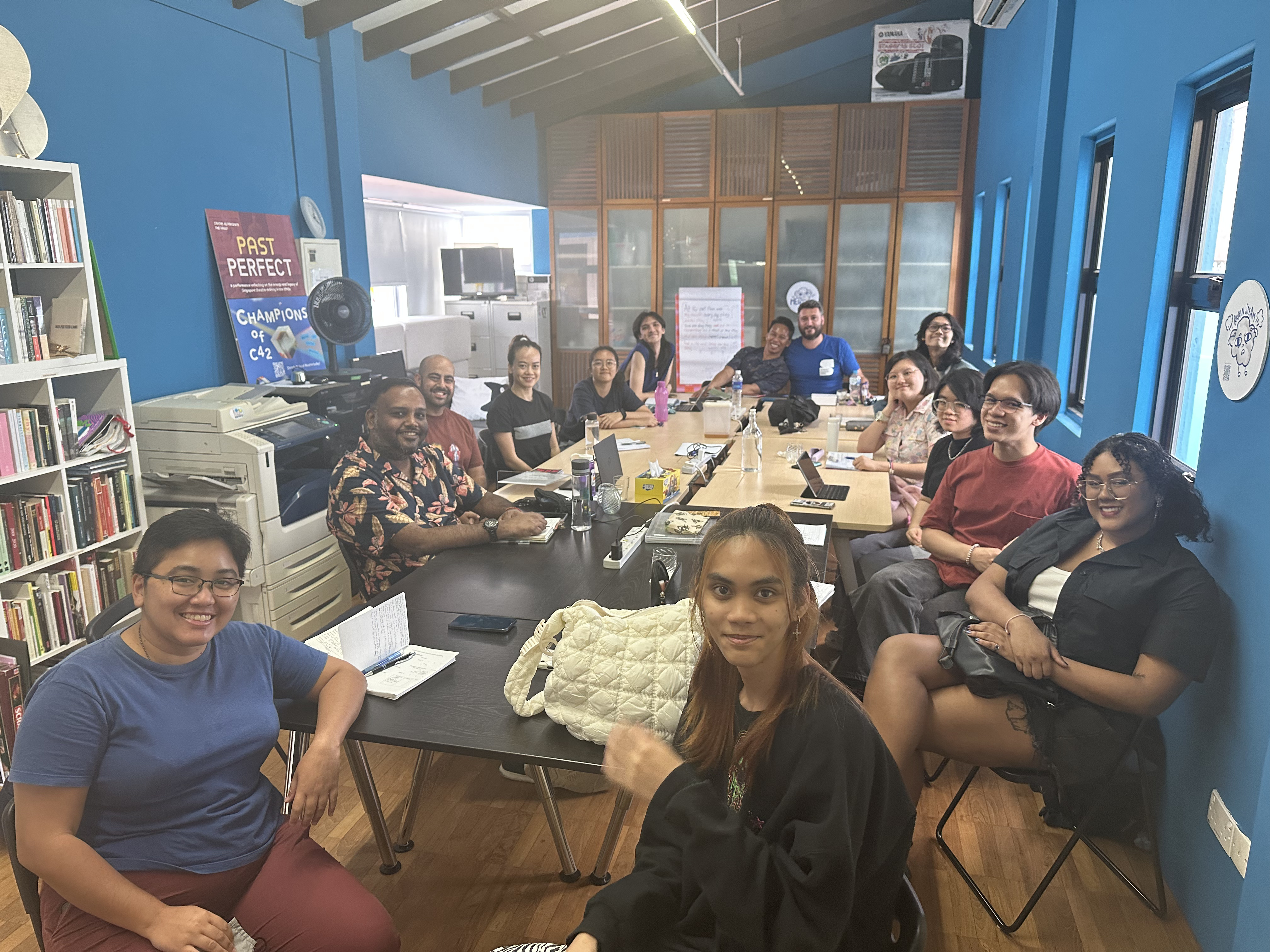 A photograph of all the participants of "Writing Queer Joy" in the Centre 42 Office.