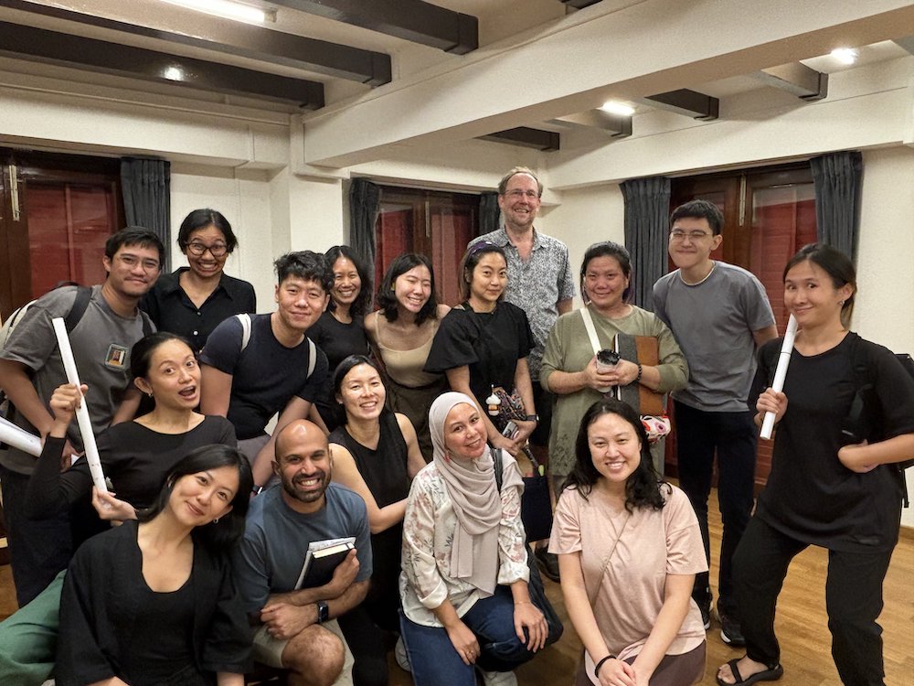 A large group photo of smiling people. A large group photo of smiling people.